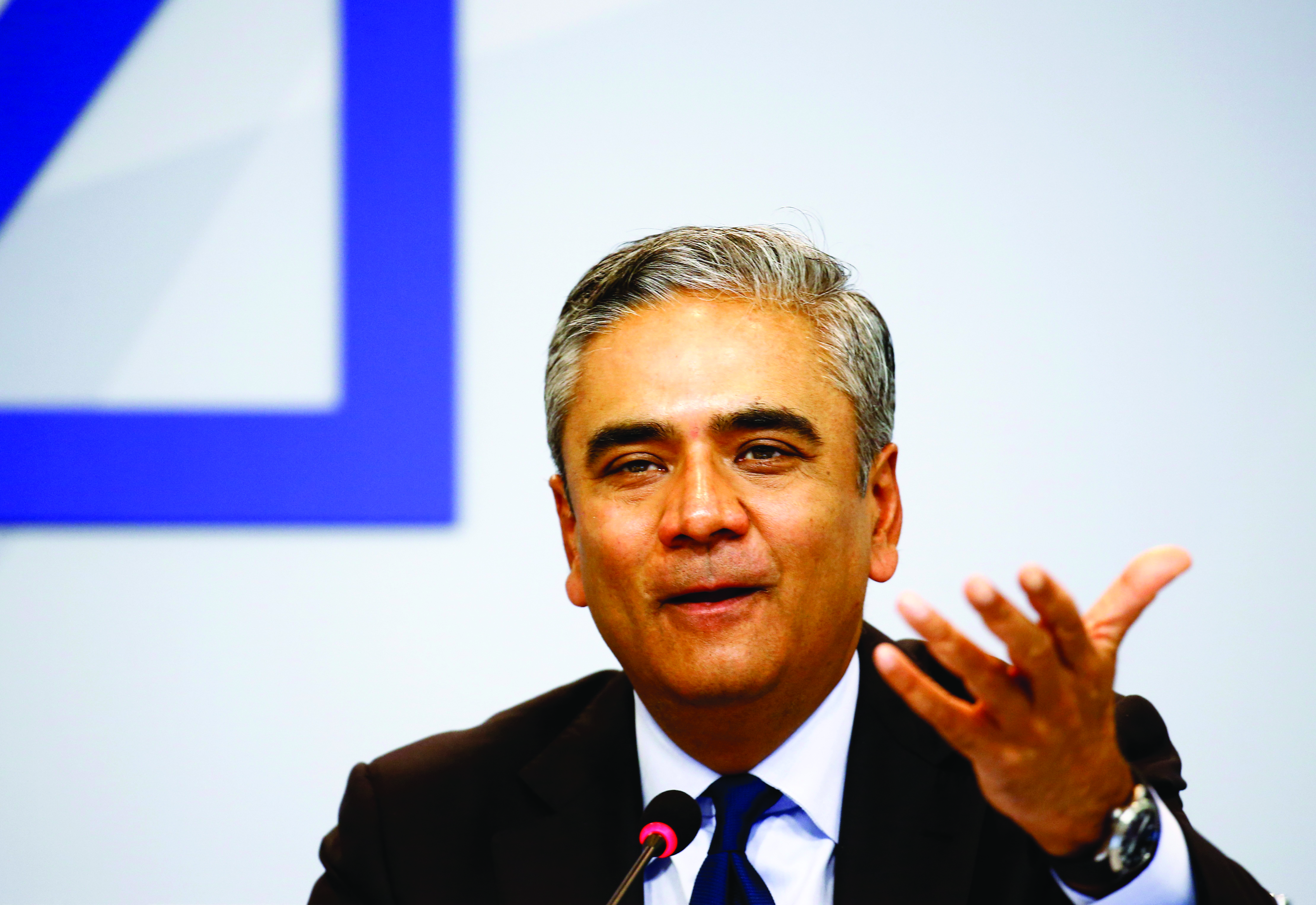 Anshu Jain, co-CEO of Deutsche Bank, gestures at a news conference in Frankfurt, Germany, April 27, 2015. Deutsche Bank will cut 200 billion euros ($217.5 billion) in investment bank assets and exit a tenth of the countries in which it operates as part of a restructuring program designed to boost earnings and cut risk. REUTERS/Kai Pfaffenbach - RTX1AFMH