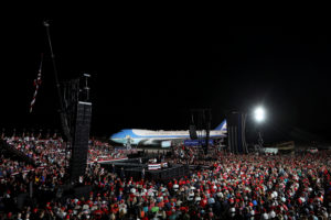 U.S. President Donald Trump speaks during a campaign rally, his first since being treated for the coronavirus disease (COVID-19), at Orlando Sanford International Airport in Sanford, Florida, U.S., October 12, 2020. REUTERS/Jonathan Ernst     TPX IMAGES OF THE DAY