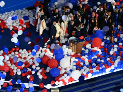 Vice President Kamala Harris is joined by family and friends onstage after accepting the Democratic nomination for president last month at the convention in Chicago.