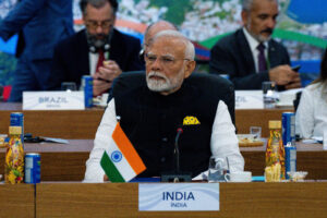 FILE PHOTO: Indian Prime Minister Narendra Modi listens as President Joe Biden, not pictured, delivers remarks during an event launching the Global Alliance Against Hunger and Poverty at the G20 Summit at the Museum of Modern Art in Rio de Janeiro, Brazil on Monday, Nov. 18, 2024. Eric Lee/Pool via REUTERS/File Photo