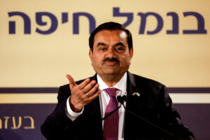 FILE PHOTO: Indian billionaire Gautam Adani speaks during an inauguration ceremony in Haifa port, Israel January 31, 2023. REUTERS/Amir Cohen/File Photo