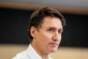 FILE PHOTO: Canada's Prime Minister Justin Trudeau makes an announcement at Aylesbury Public School in Brampton, Ontario, Canada, November 22, 2024.   REUTERS/Carlos Osorio/File Photo